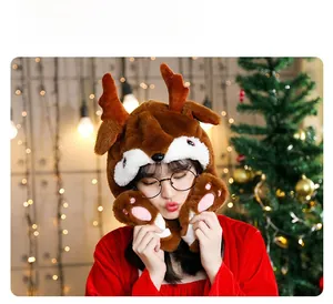 Close-up of brown plush reindeer hat with moving ears and antlers for Christmas