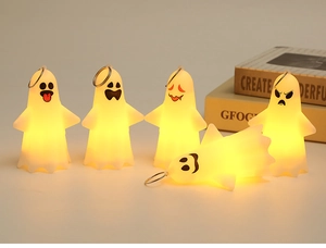 Close-up of five ghost LED candle lights with varied funny expressions and keyrings