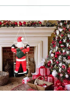 Hanging Santa Claus figurine climbing a rope ladder with gift bag by a cozy fireplace