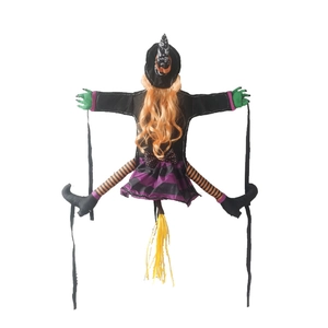 Outdoor Halloween crashing witch decoration with orange hair and LED lights for trees
