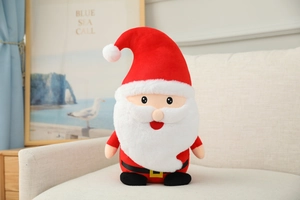 Detail of plush Santa Claus figure with moving ears on a cozy cream-colored sofa