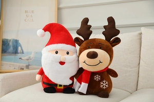 Close-up of plush Santa Claus and reindeer toys featuring soft fabric and festive details