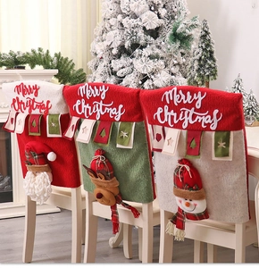 Detail of Christmas chair covers with 3D Santa, Reindeer and Snowman plush appliques