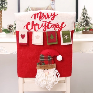Detail of Santa Claus chair cover with Merry Christmas text and 3D applique decorations