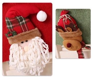 Detail of Christmas chair covers featuring 3D Santa and Reindeer with plaid fabric details
