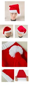Detail showing elastic knit fabric and soft white pom-pom of the Christmas hat