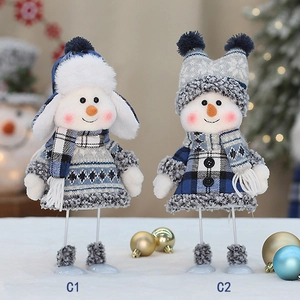 Blue fabric Christmas snowman plush figurines on stands for holiday table decorations
