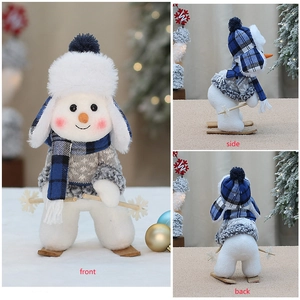 Detailed views of a blue fabric snowman doll with skiing gear and a checkered hat