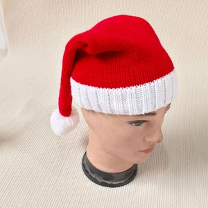Classic red and white knitted Christmas hat with pompom for adults and children
