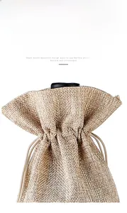 Detail of burlap wine bag featuring a ruffled top edge and natural jute fiber texture