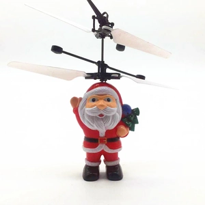 Flying Santa Claus induction aircraft toy with dual rotor blades on white background