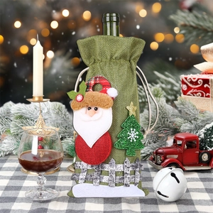 Copribottiglia di vino natalizio con Babbo Natale e albero su tela di sacco verde
