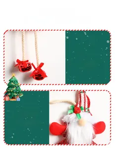 Detailed view of plush Christmas gnome with red striped hat and golden metal bell
