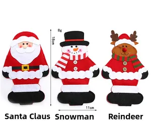 Detailed view of Santa, Snowman and Reindeer cutlery holders with 18cm by 11cm dimensions