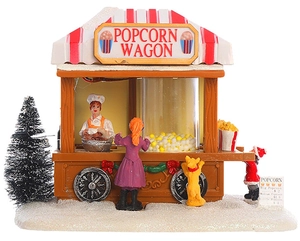 Scena in miniatura del carretto dei popcorn di Natale con Babbo Natale e luci