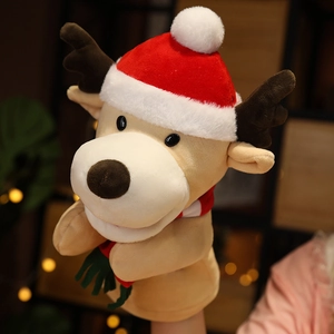 Detail of plush Christmas reindeer hand puppet with red hat and scarf for storytelling