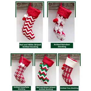 Detailed close-up of festive knitted Christmas stockings with elk and snowflake patterns