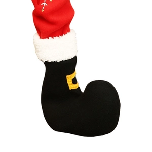 Weihnachtliche Stuhlbeinschoner im roten Stiefel-Design mit weißem Kunstpelz-Besatz