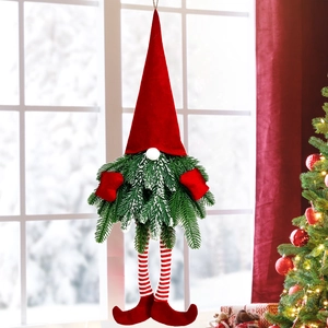 Christmas gnome wreath decoration with red velvet hat and striped long legs for holiday door hanging
