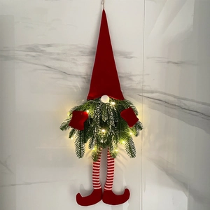 Lighted Christmas gnome wreath with pine needles, striped long legs and LED warm lights