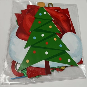 Close-up of DIY Merry Christmas paper banner kit in original packaging for party decor