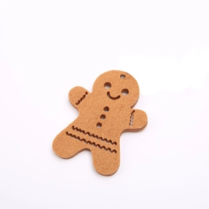 Brown felt gingerbread man ornament with white wave trim and buttons for Christmas tree decoration