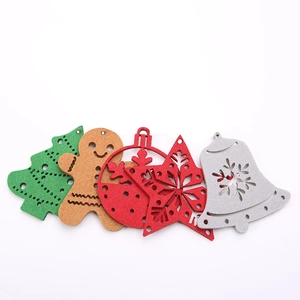 Felt Christmas ornaments set with gingerbread man, tree, and snowflake on white background