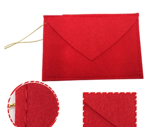 Macro detail of red felt Christmas envelope showing durable stitching and gold hanging cord