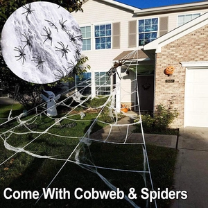Outdoor Halloween decoration set with large white web and giant furry black spider