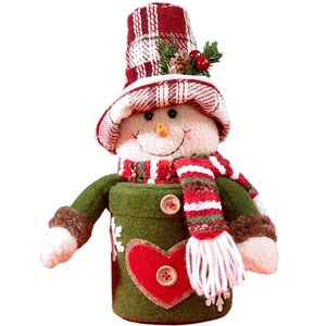 Pot à bonbons bonhomme de neige de Noël avec bonnet à carreaux sur fond blanc pur