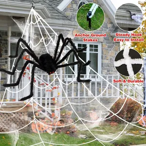 Giant black furry spider and white web set with hooks and stakes for outdoor Halloween decor