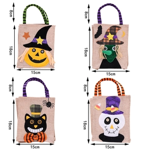 Detail of Halloween non-woven gift bags with pumpkin, witch, black cat and skull patterns