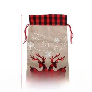 Large burlap Christmas drawstring gift bag with reindeer pattern and size 56x38cm details
