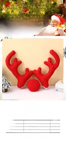 Detailed view of large red plush reindeer antlers and nose car decoration set
