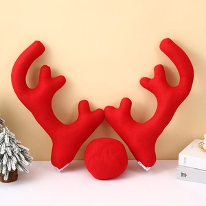 Detail of red plush reindeer antlers and nose car decoration kit for festive car styling