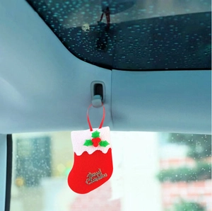Red felt Christmas stocking car ornament with gold Merry Christmas print and holly detail