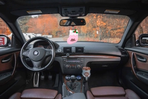 Pink Christmas stocking car hanging ornament with Merry Christmas text on rear view mirror