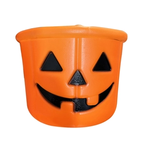 Classic orange Halloween pumpkin bucket with Jack-o'-lantern face and black handle