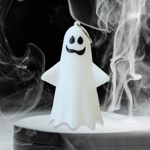 Detailed view of a white glowing Halloween ghost pendant with a cute smiling face design