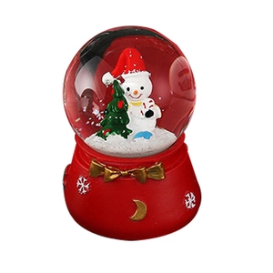 Christmas snowman snow globe with red resin base and festive tree inside for holiday decor