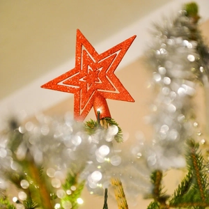 Sparkling red 3D star tree topper with glitter finish and hollow tiered design