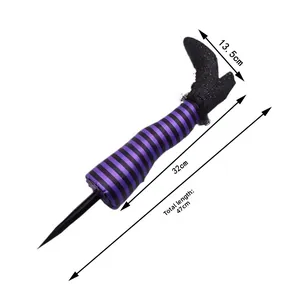Detail of 47cm Halloween witch legs stakes with purple striped socks and glitter boots