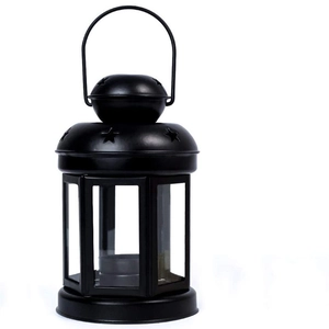 European vintage black metal lantern with star cutouts and clear glass for Christmas decor