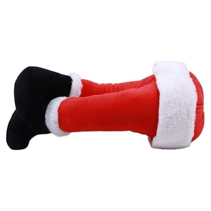 Christmas tree decoration featuring stuffed Santa elf legs in classic red and white plush