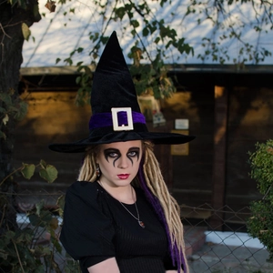 Black velvet witch hat with purple ribbon and gold buckle for Halloween costumes