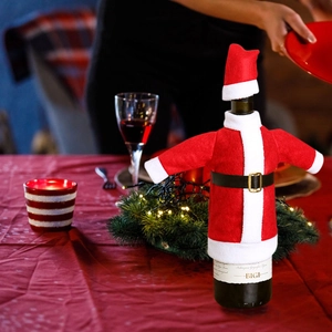Christmas wine bottle cover featuring a Santa Claus outfit with a mini red coat and hat