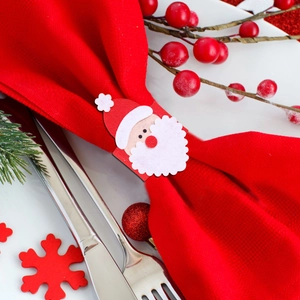 Festive Santa Claus napkin ring in red and white felt for elegant Christmas table settings