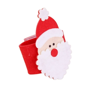 Detail of Santa Claus napkin ring made of soft red felt for festive Christmas table decor