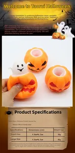 Macro shot of Halloween TPR pumpkin squeeze toy showing the ghost popping out from inside