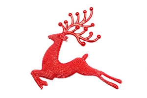 Detail showing a jumping red reindeer ornament with dense beaded texture and glossy finish